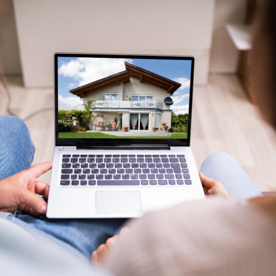 Couple looking at houses online