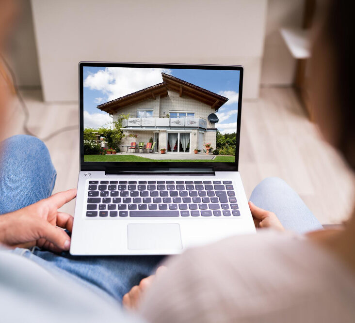 Couple looking at houses online